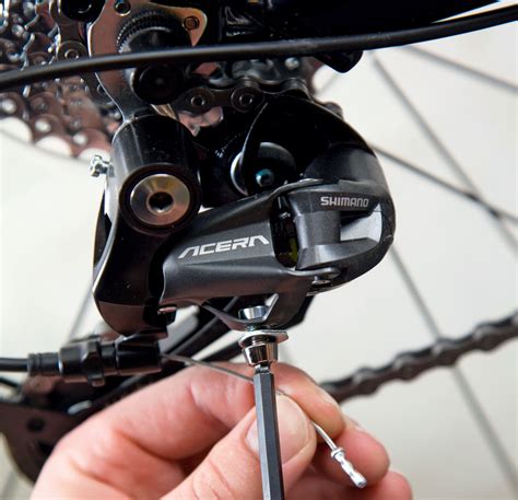 The screw is usually marked by a small letter. . How to adjust shimano front derailleur